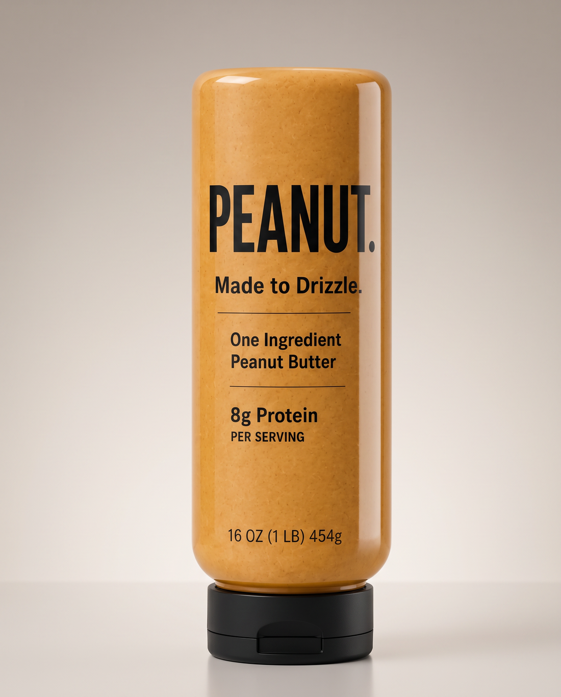 The PEANUT. squeeze bottle standing on its cap, front label showing